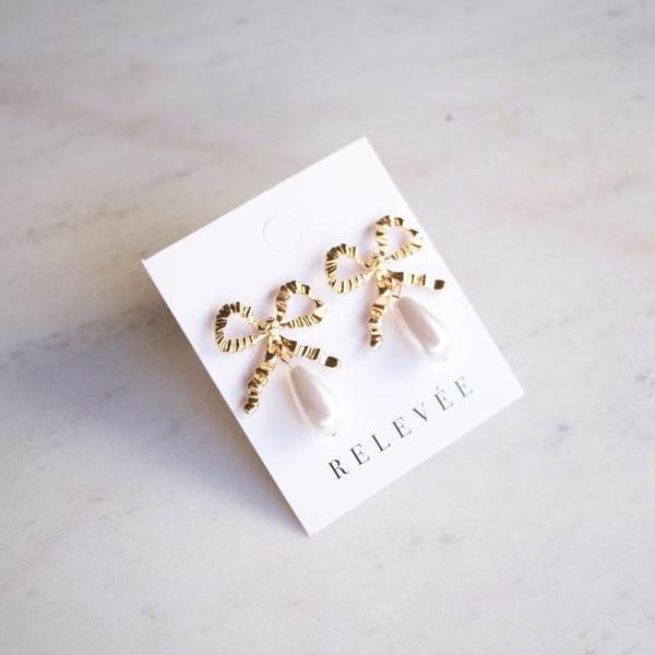 Aretes Statement Bow